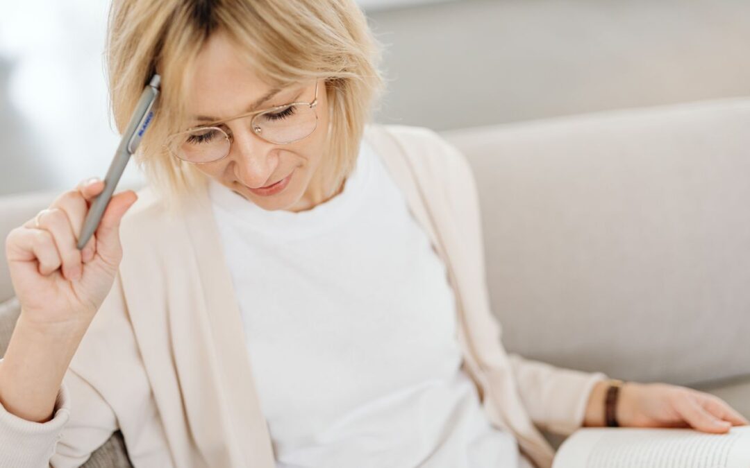 Woman reflecting on her life and learning to prioritise herself, reconnect with her self-worth and embrace a new chapter.